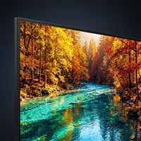 Close-up of Samsung Crystal UHD 4K screen showing a vivid autumn landscape, color quality