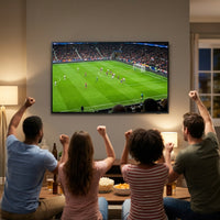 Friends watching a live soccer match together on a wall-mounted Samsung 75-inch 4K TV